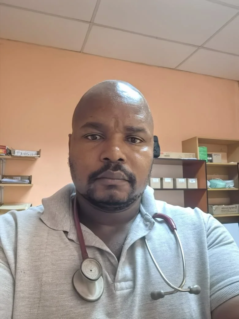 Dr Matome Moloto wearing a stethoscope at his Burgersfort practice